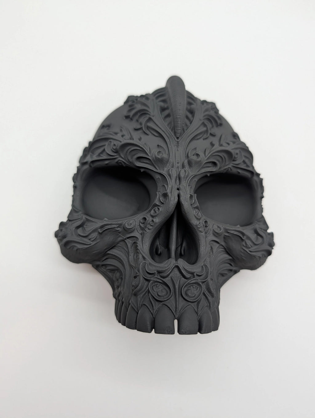 Ornate Filigree Skull with Hidden Compartment