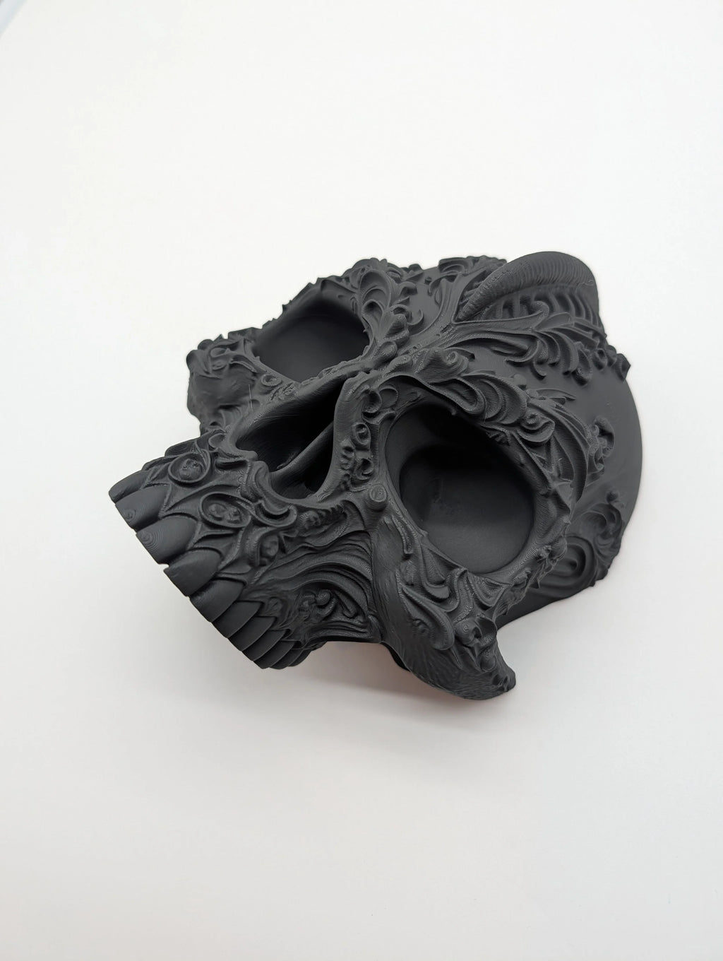 Ornate Filigree Skull with Hidden Compartment
