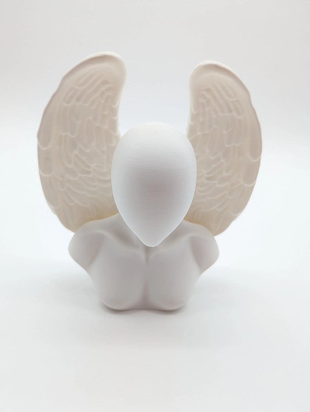 Ethereal Sentinels: The Faceless Angel Statue