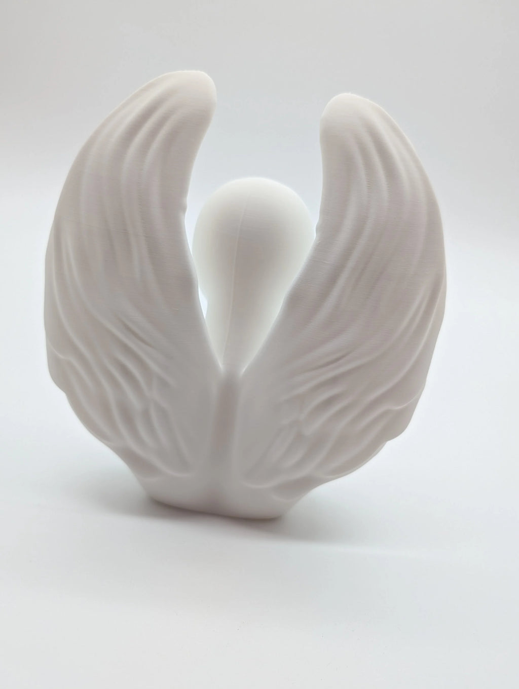 Ethereal Sentinels: The Faceless Angel Statue