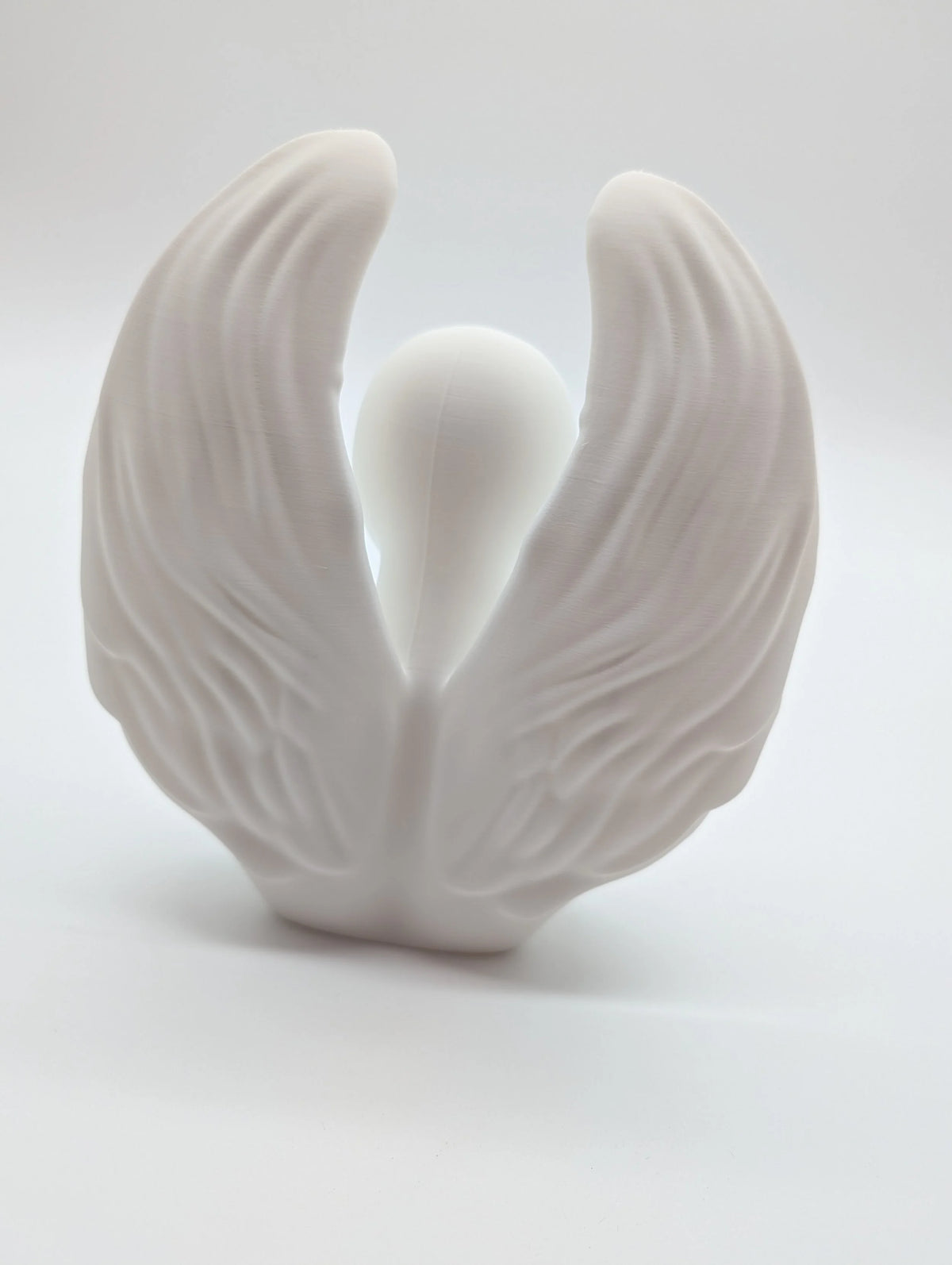 Ethereal Sentinels: The Faceless Angel Statue