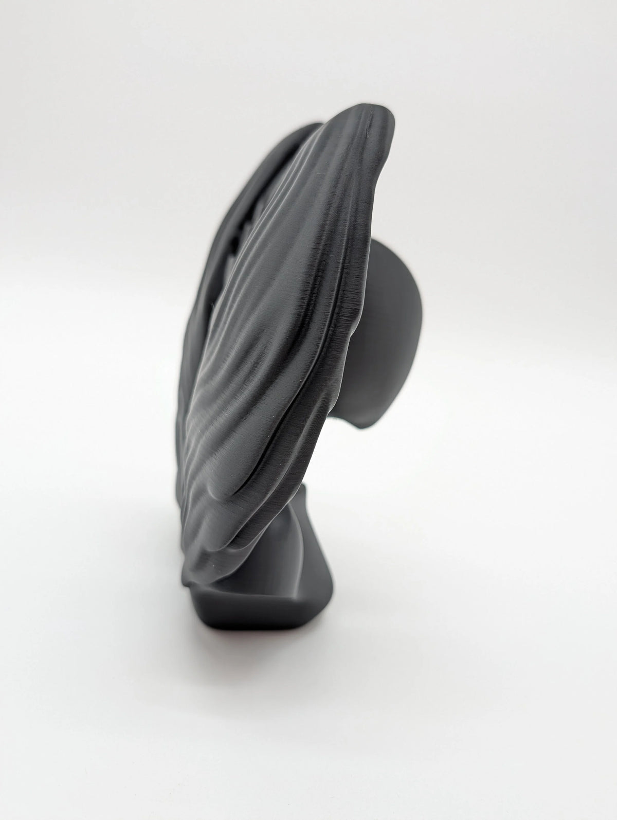 Ethereal Sentinels: The Faceless Angel Statue