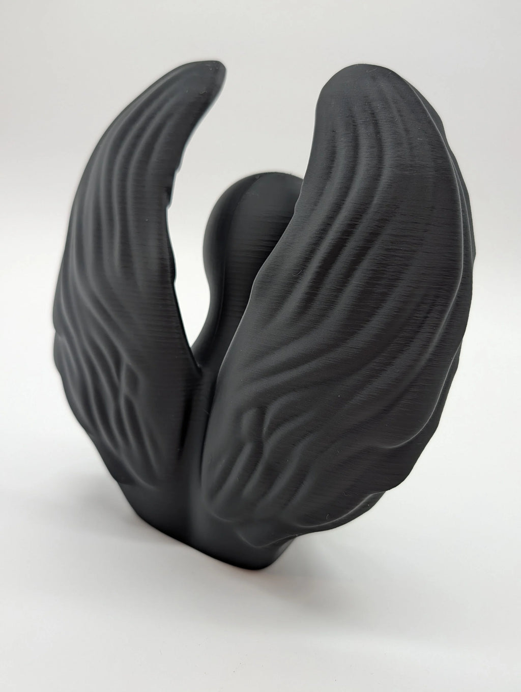 Ethereal Sentinels: The Faceless Angel Statue
