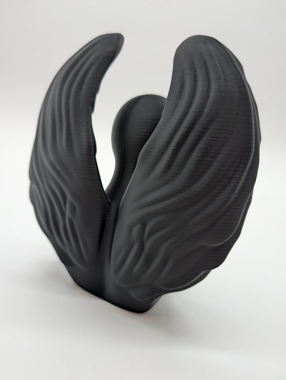 Ethereal Sentinels: The Faceless Angel Statue